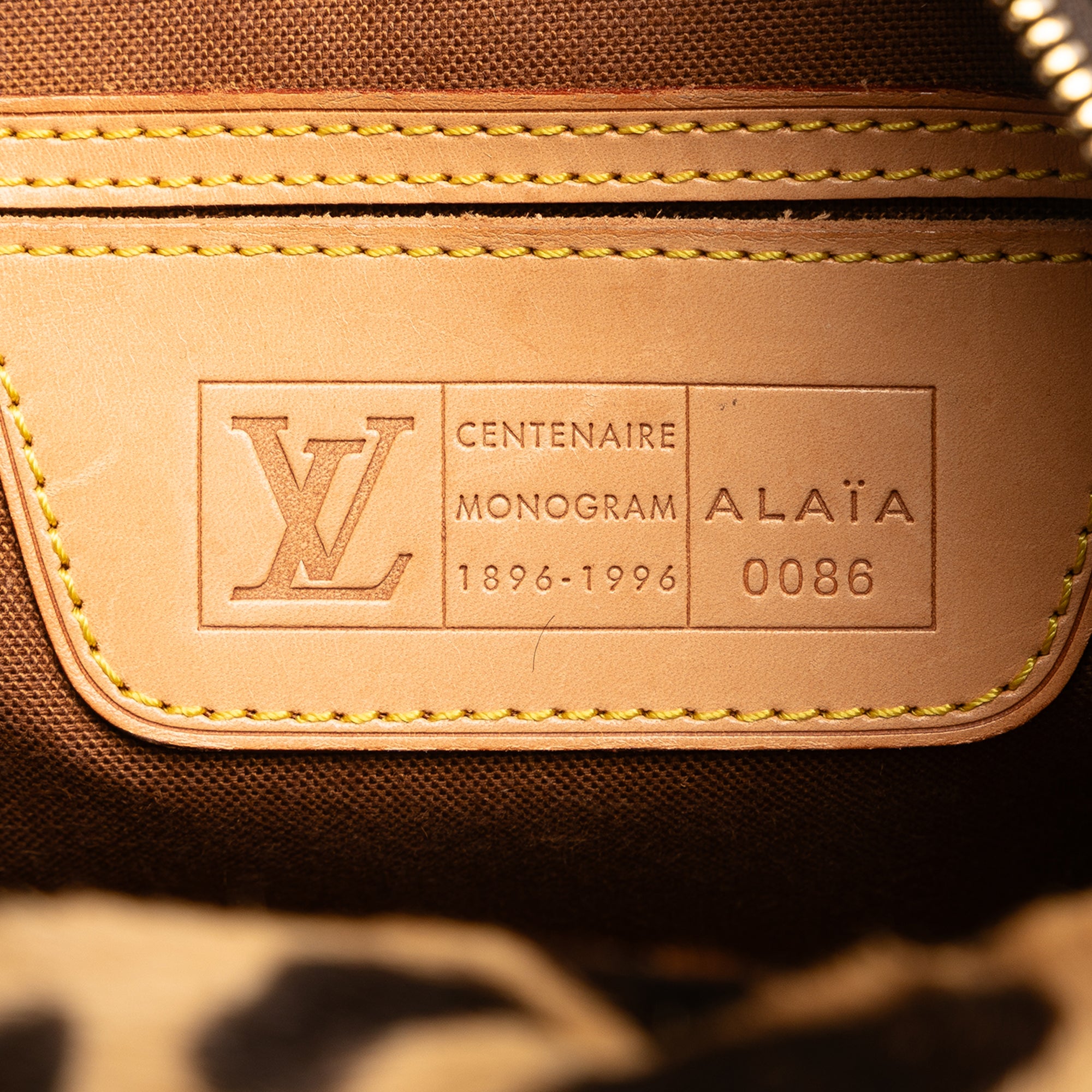 Louis Vuitton Monogram Vivienne Mini Pochette Accessoires M69752