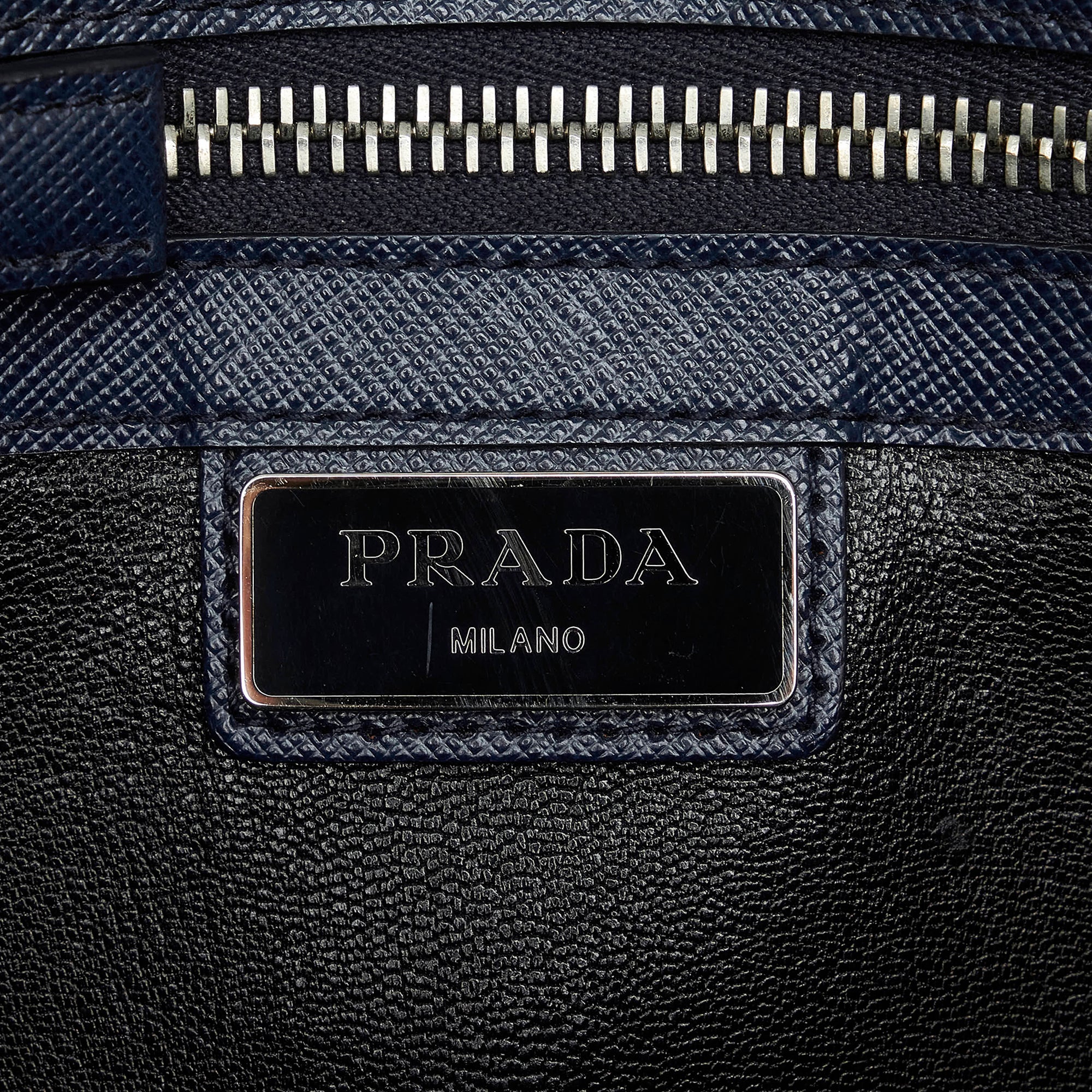 Prada Blue Saffiano Envelope Pushlock Clutch Navy blue Leather Pony-style  calfskin ref.999510 - Joli Closet