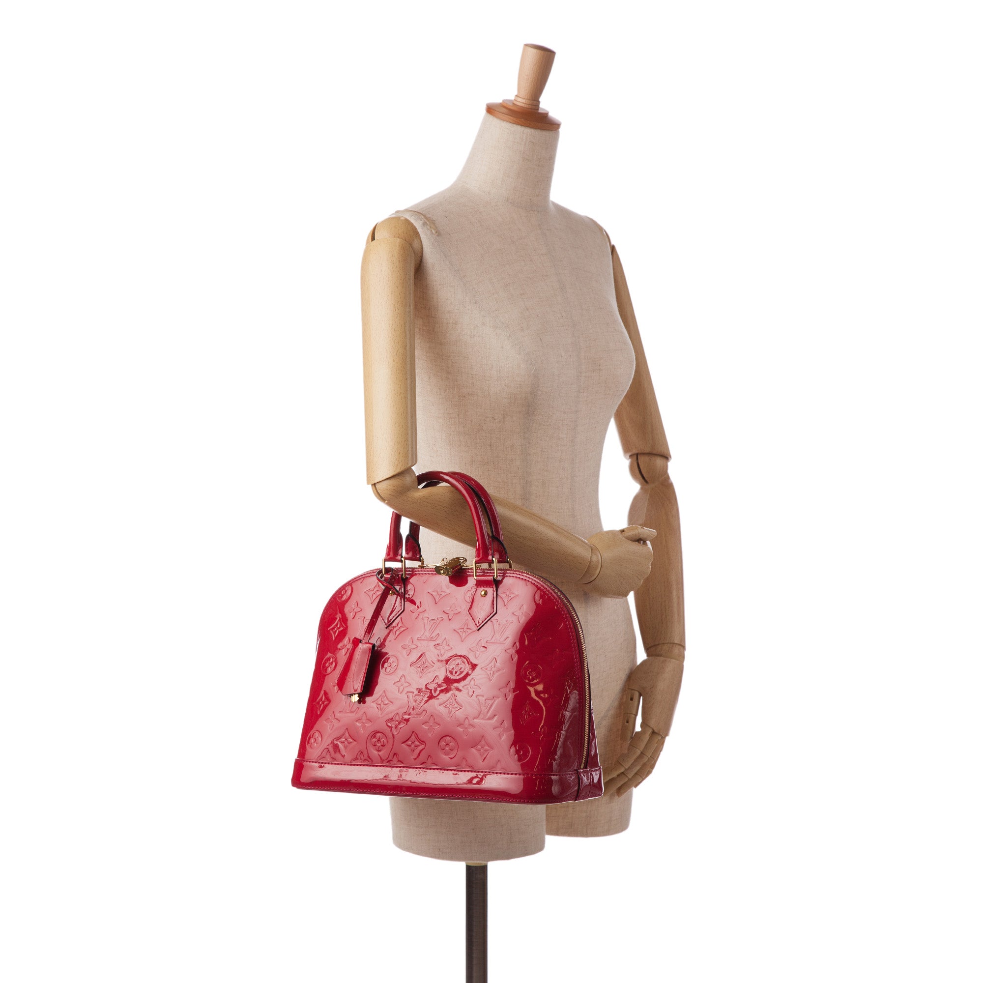 Louis Vuitton Vernis Stickers Alma Bb Ladies Handbag at Best Price