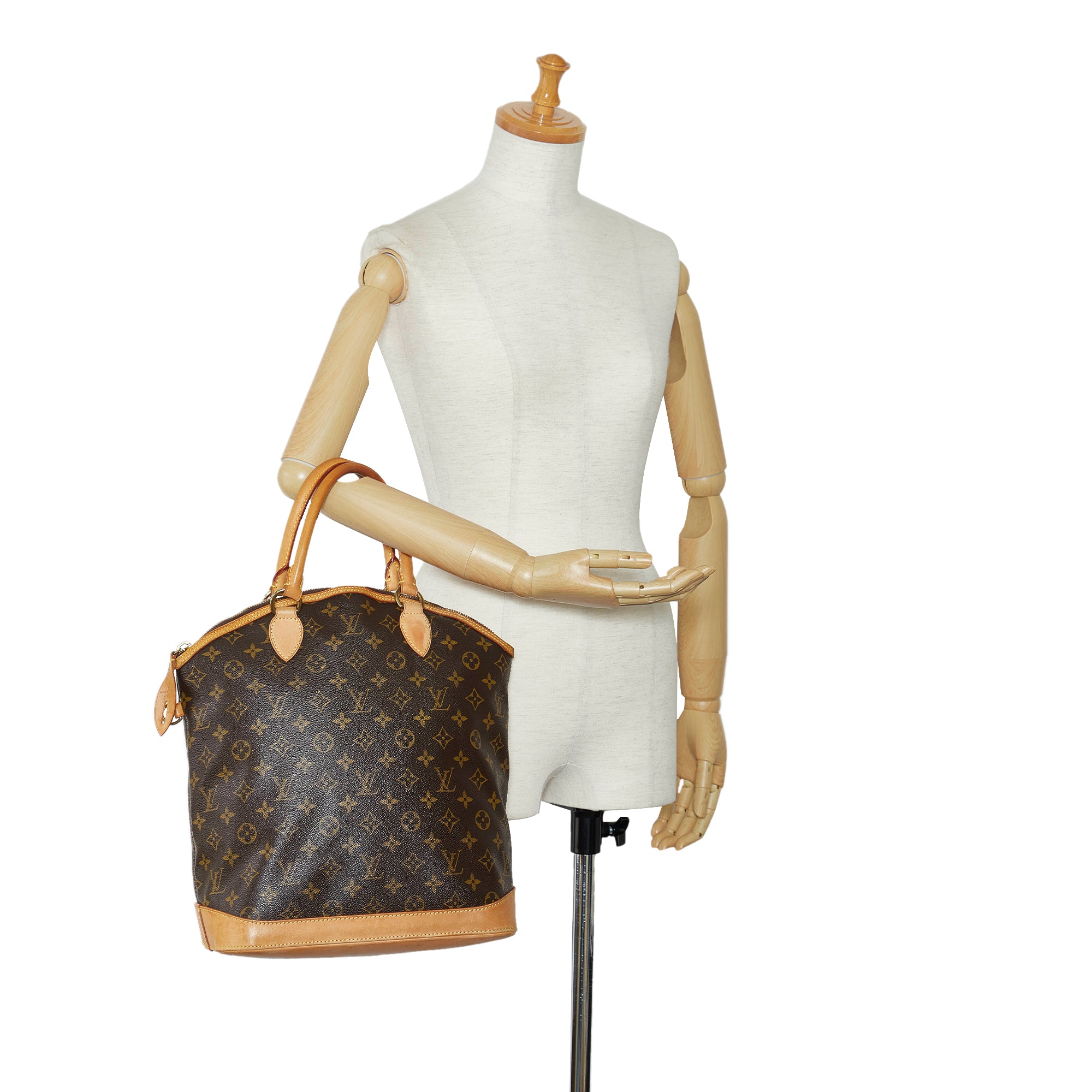 Louis Vuitton Brown Monogram Lockit Vertical Handbag at 1stDibs  louis  vuitton lockit vertical, lv lockit vertical, lockit louis vuitton