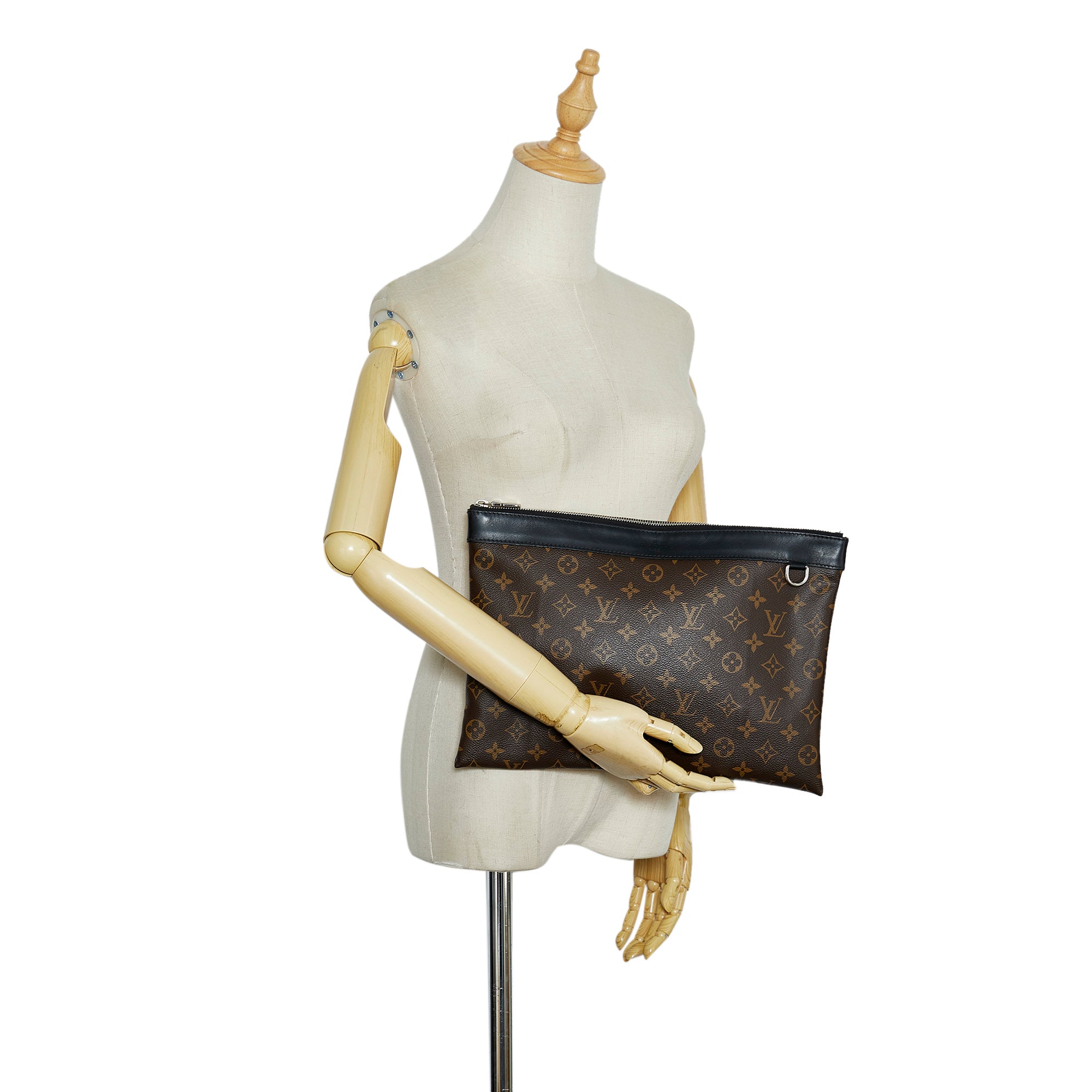 Shop authentic Louis Vuitton Monogram Eclipse Discovery Pochette