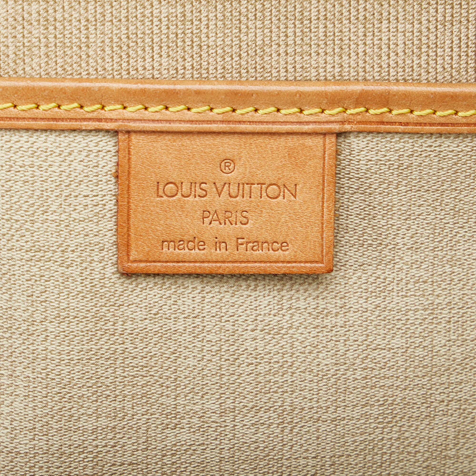 Louis Vuitton Excursion Canvas Handbag (pre-owned) in Brown